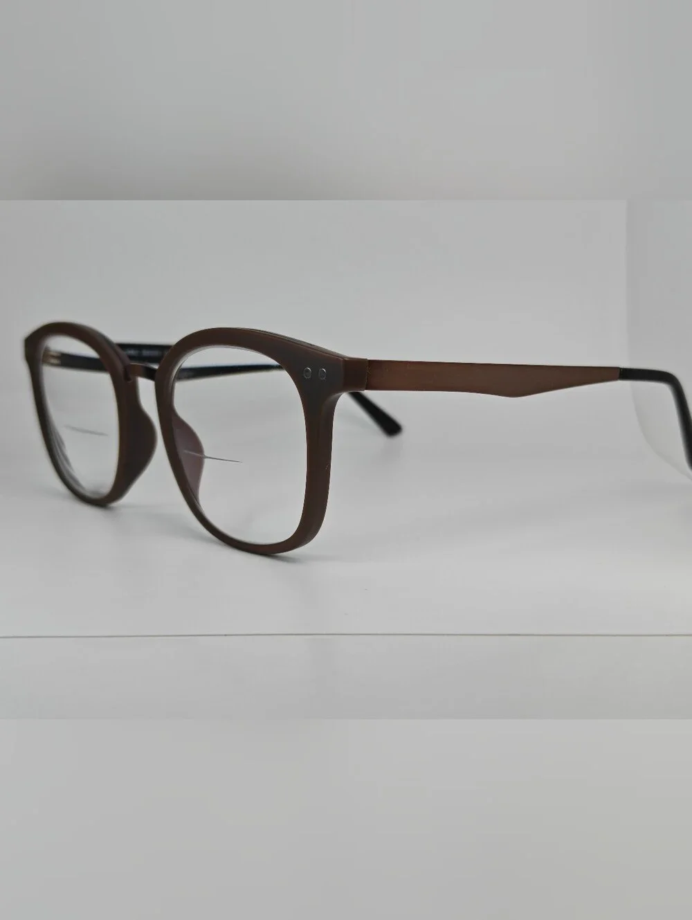 Lyric. Mocha Bronze Round Eyeglass Frames.